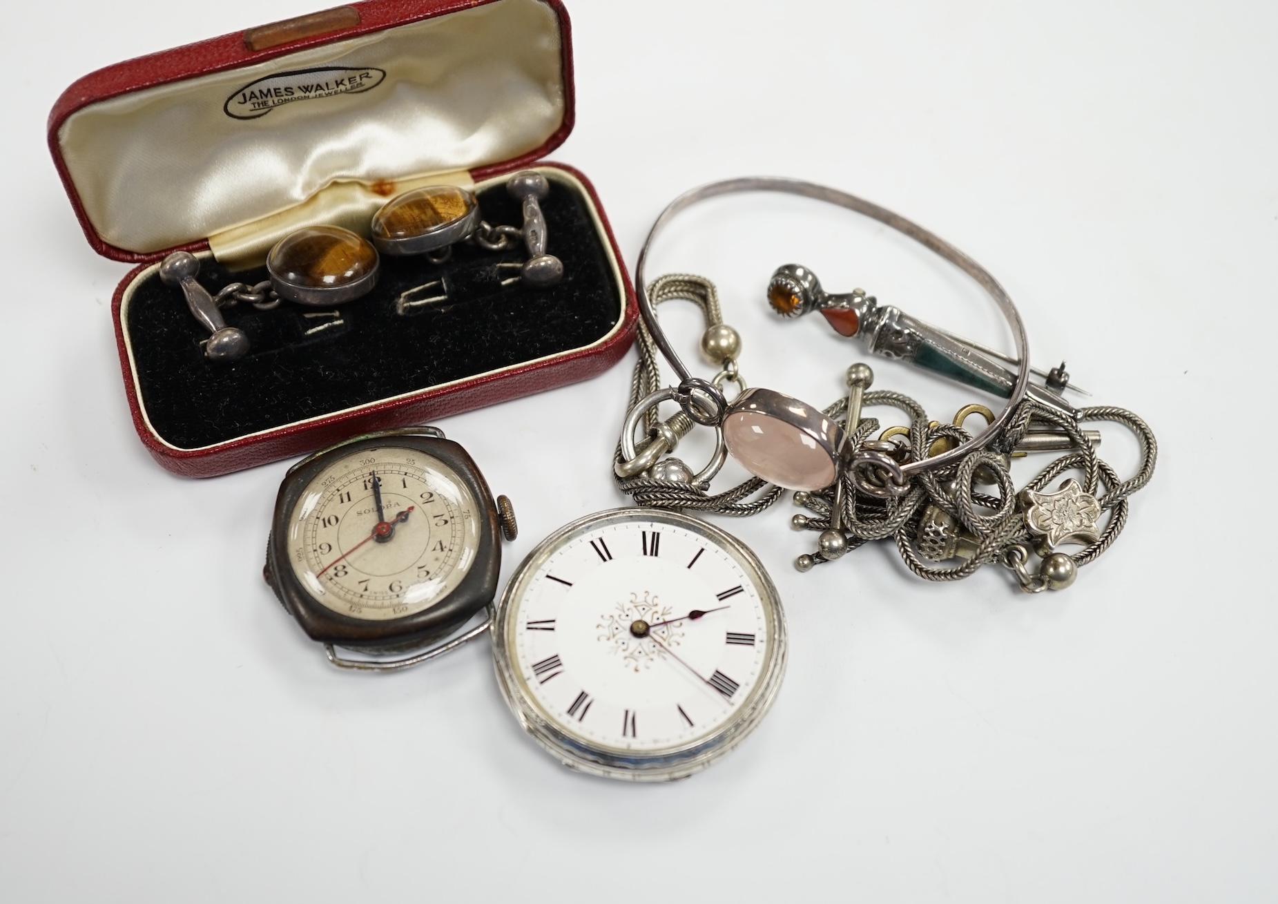 A pair of 925 and tiger's eye quartz set cufflinks, a silver and Scottish hardstone set brooch, a Scottish silver and rose quartz set bangle, a white metal fob watch and albertina and a base metal wrist watch.